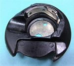 BOBBIN CASE-NEW HOME TOP LOAD