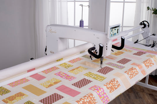 Baby Lock Regalia ( NO PROSTITCHER) w/ Maestro 10 foot frame Carrage Front handle bars & Bobbinwinder (In Store)